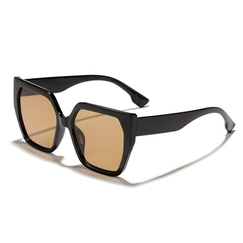 Lunettes de soleil carrées masquant la fatigue avec leur monture large noire