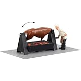 Der Ochse wird, vom Grillmeister persönlich, fachmännisch auf dem drehenden Spieß gegrillt