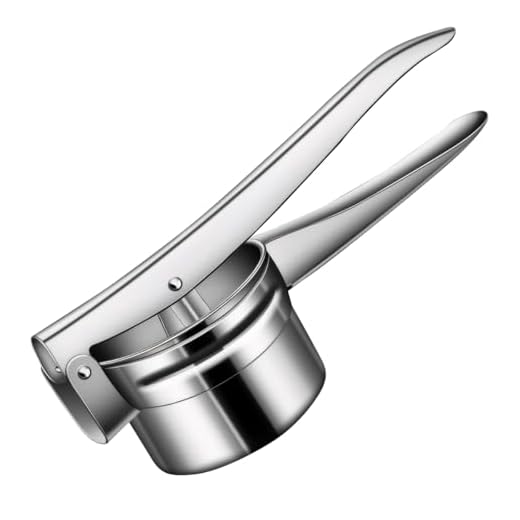 Lo schiacciapatate in acciaio inox – durevole e facile da pulire Uno spremiagrumi in acciaio inox e patate e spaghetti costruiti secondo la costruzione del cestino