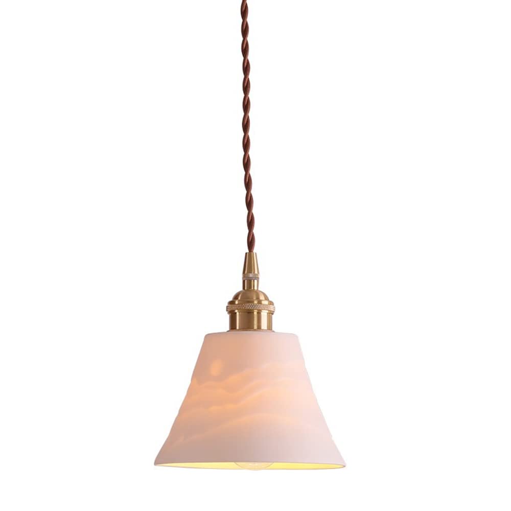 Luminaire suspendu rétro pour sublimer une chambre au plafond bas