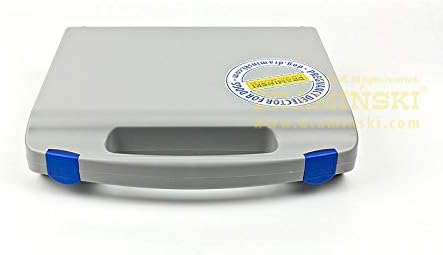 The closed grey transport case for the DRAMINSKI Pregnancy Detector, with blue latches.