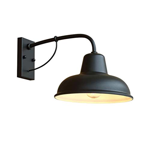 Lampe de terrasse rétro à long bras pour illuminer une porte de balcon
