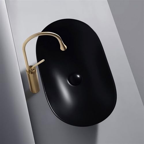 Lavabo de encimera negro que soluciona las salpicaduras en baños pequeños 6