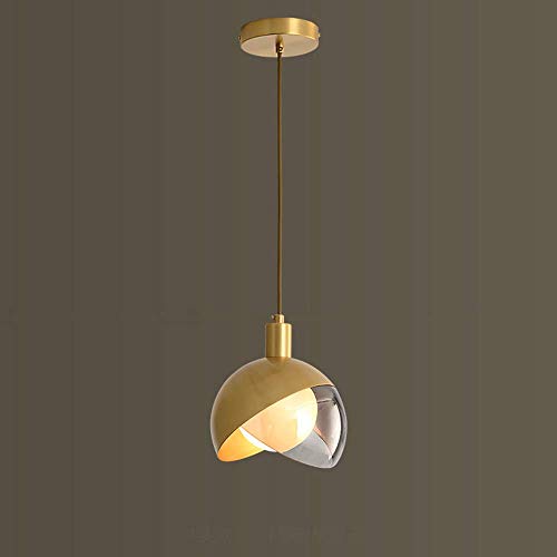 Luminaire suspendu en cuivre pour éclairer un couloir sombre ou une table basse de salon