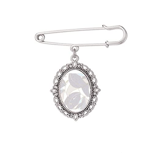 Broche de chemise art dessin couleur claire idéale pour accessoiriser un châle