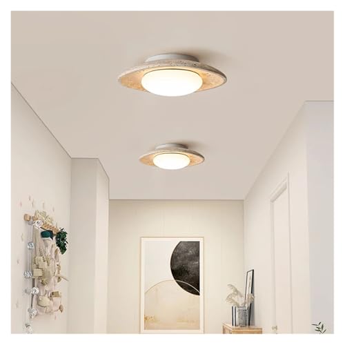 Lustre LED moderne en travertin jaune : la solution contre les salons sombres