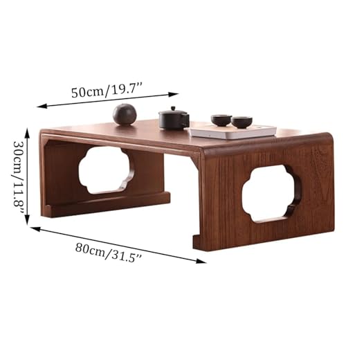Table basse pour baie vitrée créant un coin thé et méditation chaleureux