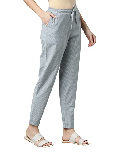 Image of GO COLORS Ikat Print Beige Printed Pencil Pant for Women | Breathable, Side Pocket