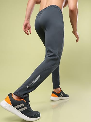 Image of TECHNOSPORT Men's Slim Fit Track Pants with Zip Pockets, ELASTO Plus Quick Dry Stretchable Lightweight Lower for Gym Running Yoga and Sports