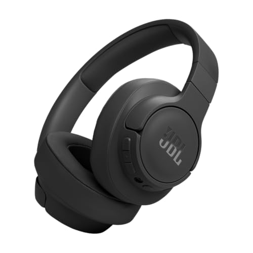 JBL Tune 770NC over-ear headphones in matte black on a long-haul travel pillow with the JBL orange-and-black logo on the ear cup, a USB-C charging port and a 3.5mm jack visible, soft-padded headband — the sub-$100 endurance pick with 70 hours total battery at US$99