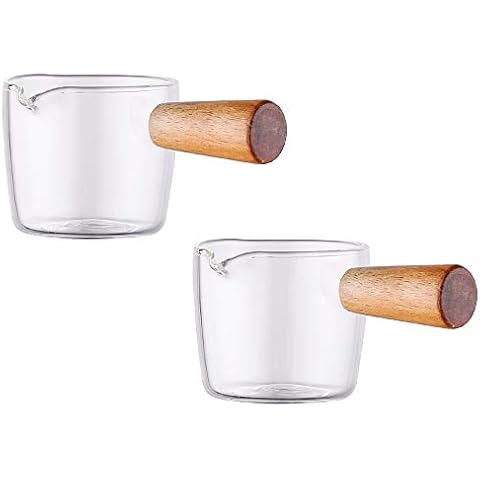 Sizikato 2 cremas de cristal transparente con mango de madera Cover