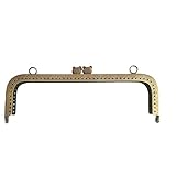 Medidas: 20x6.5 cm Boquilla monedero de 20x6.5 cm color oro viejo de gatos