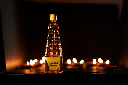 Image of Gem's Gold smoke less Nithyam Puja Oil Infused with subtle temple-inspired fragrances 1 Litre | Long Lasting Deepam Oil for Diya, Lamp, Arti, Havan & Pooja | Spiritual Non-Edible Oil for Daily Rituals & Festivals