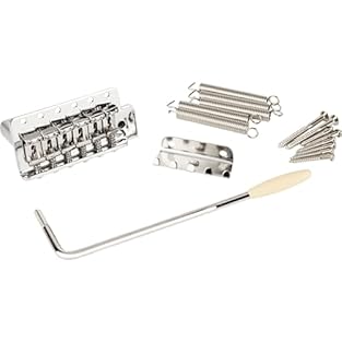 Vintage-style 2-7/32" mounting spacing Modern-style 2-1/16" string spacing Six "Fender"-stamped bridge saddles with mounting screws Tremolo claw and springs. Tremolo arm with aged white tip Used on American Performer, Special and Highway 1 Stratocast...