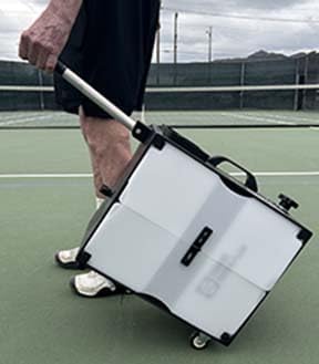 Tennis Tutor Prolite with Built-in Oscillator and Remote. Made in USA by #1 Tennis Machine Company.