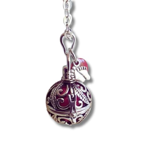 Bola de grossesse en argent pour apaiser bébé avec sa douce bille rose framboise