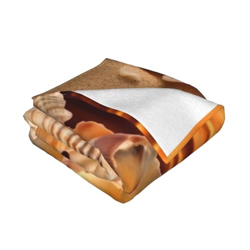 Couverture polaire coquillages légère contre le froid sur le canapé - 3
