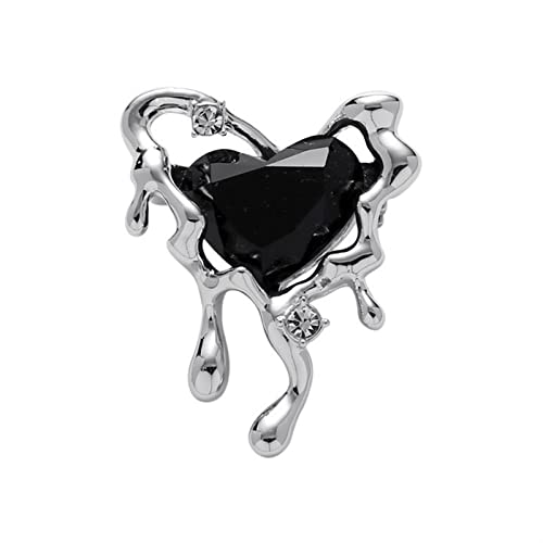 Broches d'amour noires pour rompre la monotonie d'un tailleur rigide avec élégance et modernité