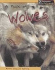 Paperback A Pack of Wolves (Animal Groups) Book