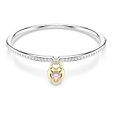 Le motif romantique affiche un Swarovski Zirconia rose au placage de ton or sur une face, et un pavé de cristaux incolores en métal rhodié sur l’autre face