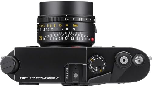 Top view of the Leica M6 camera, showing the shutter speed dial, film advance lever, and hot shoe.