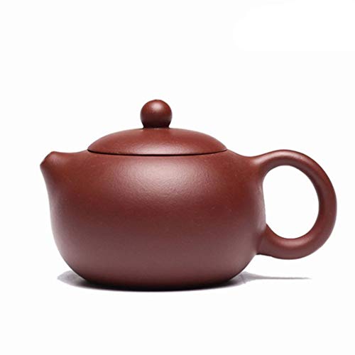 Tetera de cerámica marrón con filtro artesanal que evita hojas sueltas en tu té 2