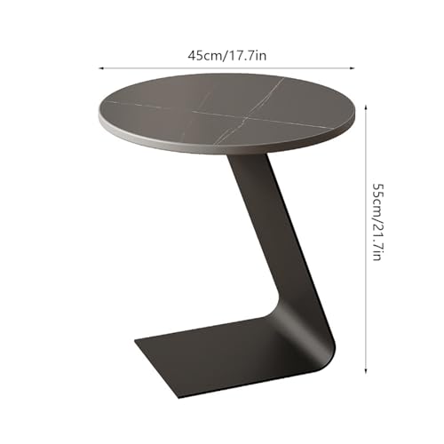 Mesa de centro pequeña para salones estrechos que soluciona la falta de espacio junto al sofá 2