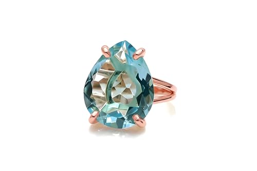 Bague topaze bleue or rose pour votre demande en mariage