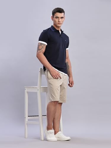 Image of Tommy Hilfiger Mens Blue Solid Polo Shirt