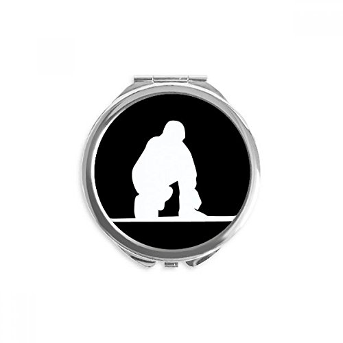 Miroir de poche silhouette skate rond pour vos retouches maquillage en déplacement