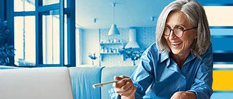 Business owner enjoying automated expense reconciliation offered by Amazon Business and Intuit integration