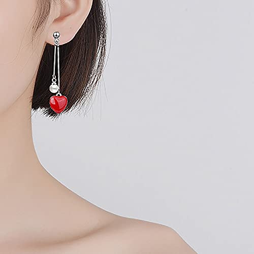 Bijoux en perles et longues gouttes d'oreilles d'exception