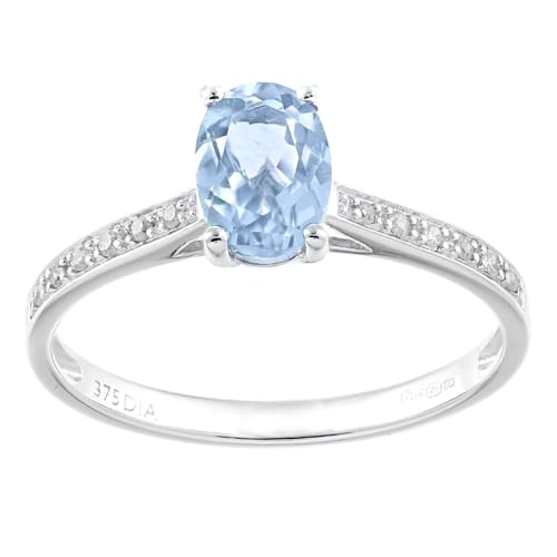 Image of Jewelco London 9ct White Gold Round 5pts Diamond Oval 0.92ct Blue Topaz Shoulder Set Solitaire Engagement Ring - Size Q