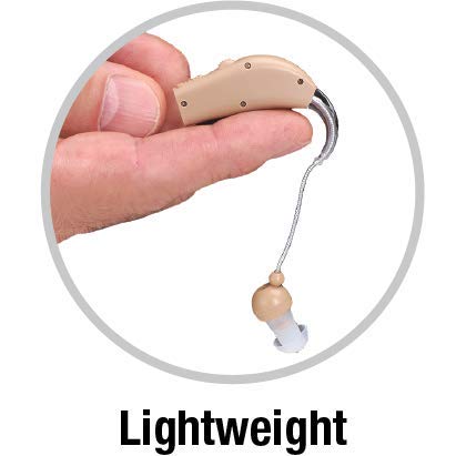 EAR BASICS Personal Sound Amplifier held in hand, showing its compact size and controls