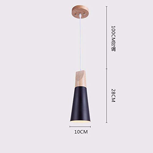 Pendentif lumière noir pour illuminer un îlot de cuisine sombre avec style et élégance