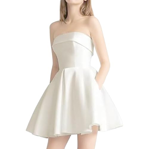 Robe invitée de mariage dos nu blanche chic pour vos soirées d'été
