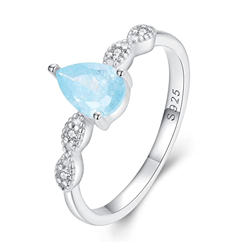 Bague solitaire poire argent massif et oxydes pavés éclatants