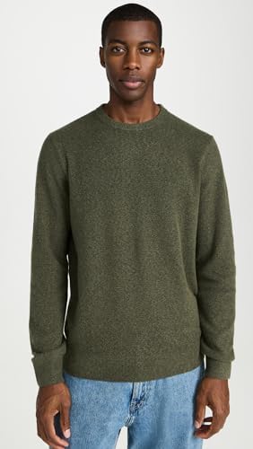Stylish man casually wearing a Faherty Jackson Crew Sweater for everyday elegance.