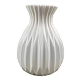 Petits vases peu encombrants pour fleurs : avec un diamètre supérieur de 8 cm et une base stable de 11 cm, ce vase compact maintient les fleurs en toute sécurité tout en occupant un minimum de surface. Facile à nettoyer et à réutiliser, un ajout fonctionnel à tout environnement de vie ou de travail moderne.