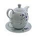 Tetera de porcelana, juego de té para uno Imagen de Tetera de porcelana, juego de té para uno