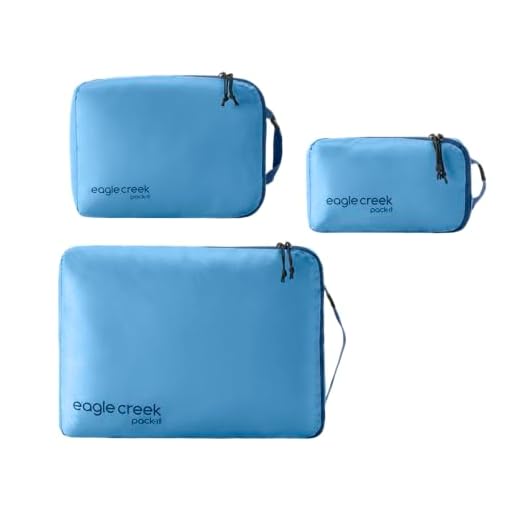 Eagle Creek Pack-It Isolate Cube Set - Compression Packing Cubes for Stackable Storage - Convenient Top Handle - Easy Grab Zipper Pull - Blue Dawn - XS/S/M - 3