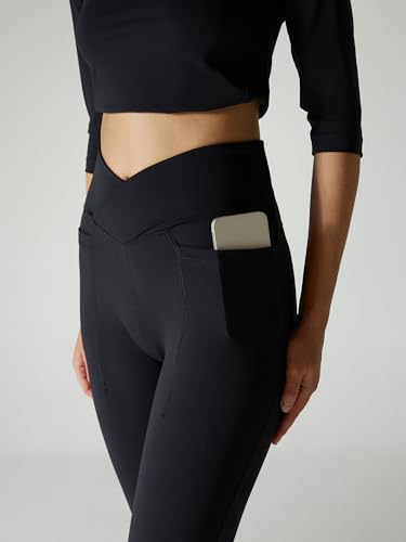 Image of CAVA Tall Hourglass Flared Leggings for Women | V-Waistband, Anti-Camel Toe Design, Tall Fit, Flared Bottoms, Deep Pockets, Sculpting Stretch Fabric