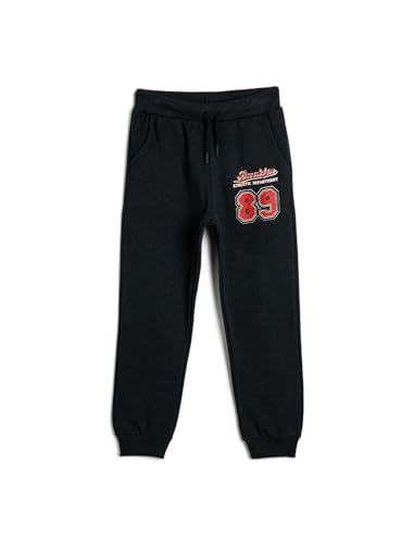 Pantalones de chándal niños Koton con cordón ajustable y motivo deportivo color azul marino