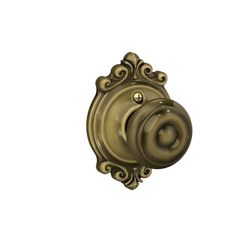 Image of SCHLAGE Georgian Knob with Brookshire Trim Non-Turning Lock, Antique Brass (F170 GEO 609 BRK)