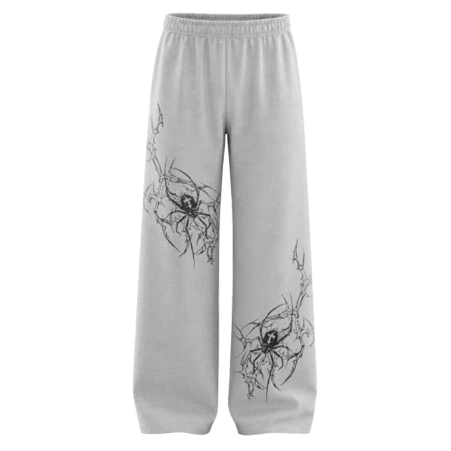 Image of Aesthetic Gothic Wide Leg Pants for Men | Tribal Print Baggy Streetwear | Oversized Track Pants with Elastic Waist | Black and White Relaxed Fit Bottoms