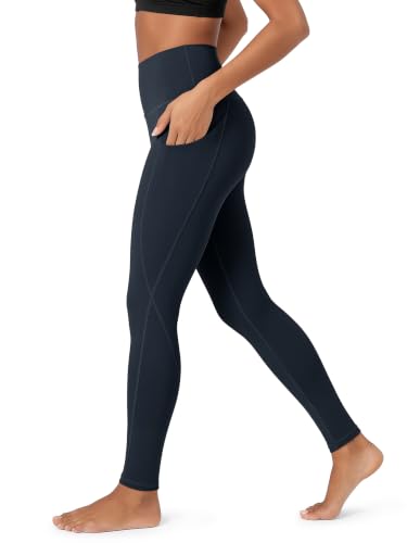 11 Amazing Yoga Pants That Hide Cellulite For Women Over 50 & Make You Feel 20 Again! 3 ODODOS Women's High Waisted Full Length Yoga Leggings with Pockets, 28' Inseam Tummy Control Non See Through Workout Athletic Running Yoga Pants, Deep Navy, Medium