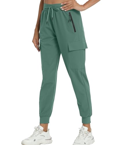 Kcutteyg Calça feminina impermeável para caminhada com bolsos, secagem rápida, macia, atlética, para