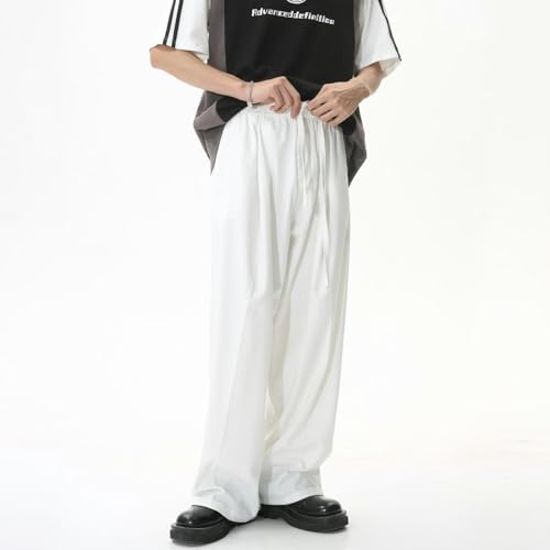 Pantalon ample fluide et drapé à taille haute pour l'été