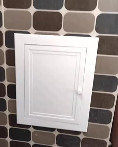 Plaque de recouvrement pour trou mural et boîte de compteur dans la cuisine