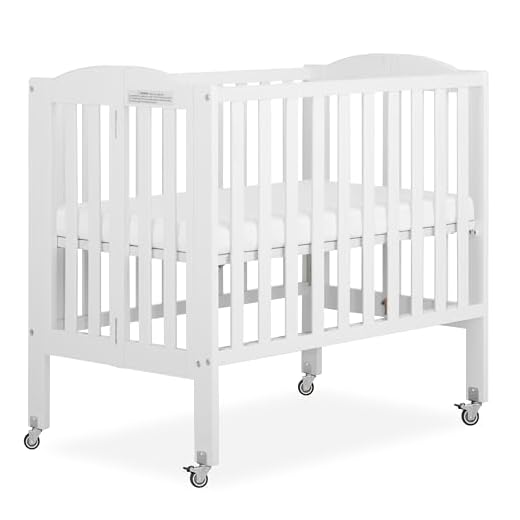 Dream On Me 2-in-1 Portable Mini Crib, Non-Full Size Baby Crib for Small Spaces, 2 Mattress Heights, Compact Travel Design, Includes Mattress, GREENGUARD Gold & BSA Certified, White
